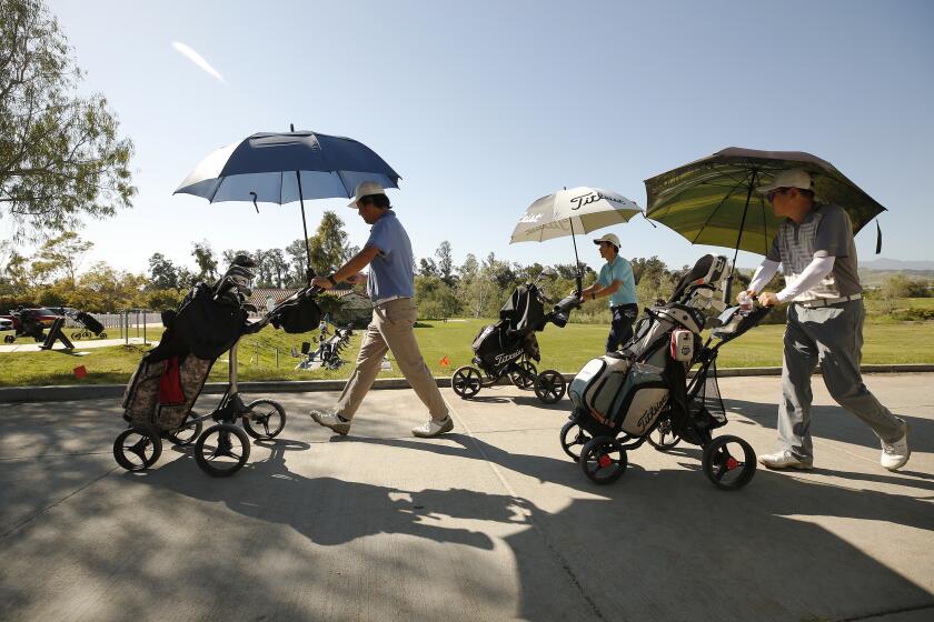 Golfers prepare to tee off at Sterling Hills Golf Club in Camarillo which opened Monday with social distancing restrictions and other precautions in place as Ventura County on Saturday modified its stay-at-home order to permit some businesses to reopen and some gatherings to take place for the first time since the restrictions were issued to fight the spread of the coronavirus COVID-19. Ventura on Wednesday, April 22, 2020 in Ventura, CA.