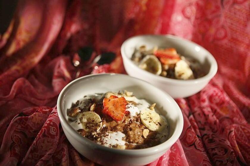 START THE DAY RIGHT: Hazelnut-chocolate oatmeal with strawberries and cream.