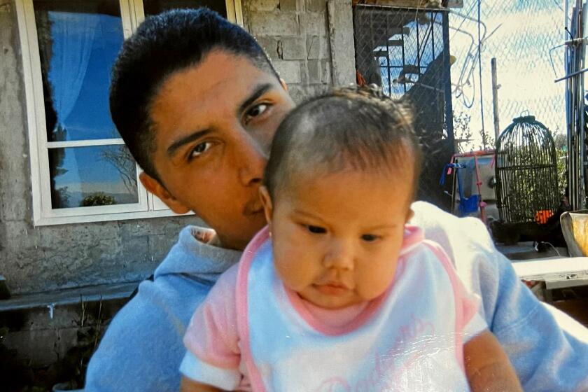 "Giovanni Luna, pictured here in an undated photo with his daughter, Starla, was shot and killed by LAPD officers during a foot chase in Westlake on Sept. 11, 2022."