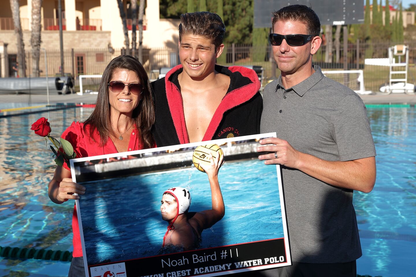 Senior Noah Baird with his parents