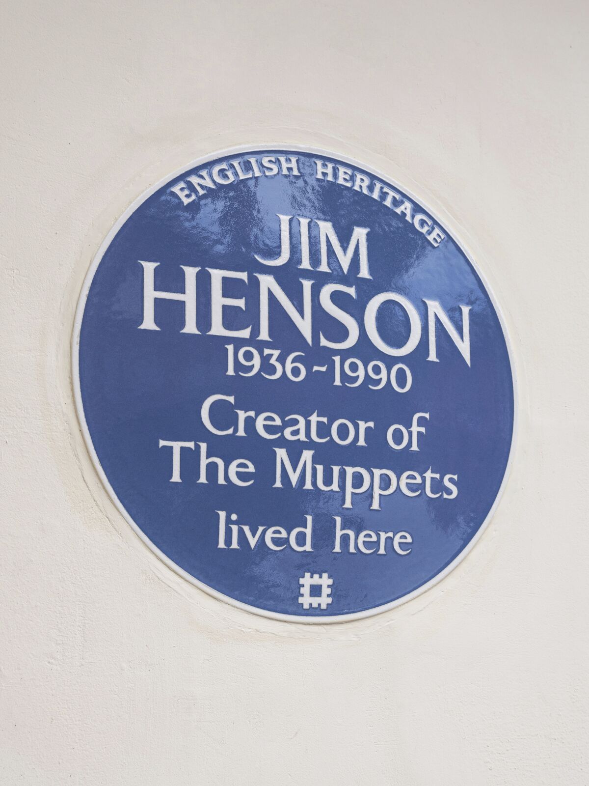 In this undated photo provided by English Heritage a view of the blue plaque on the former London home of Jim Henson, creator of The Muppets, who has been honoured with a blue plaque. The American creator of the Muppets was honored Tuesday, Sept, 7, 2021 in Britain with a blue plaque at his former home in north London, which he bought after ‘The Muppet Show’ was commissioned for British television — 50 Downshire Hill in Hampstead in north London to be precise. (English Heritage via AP)