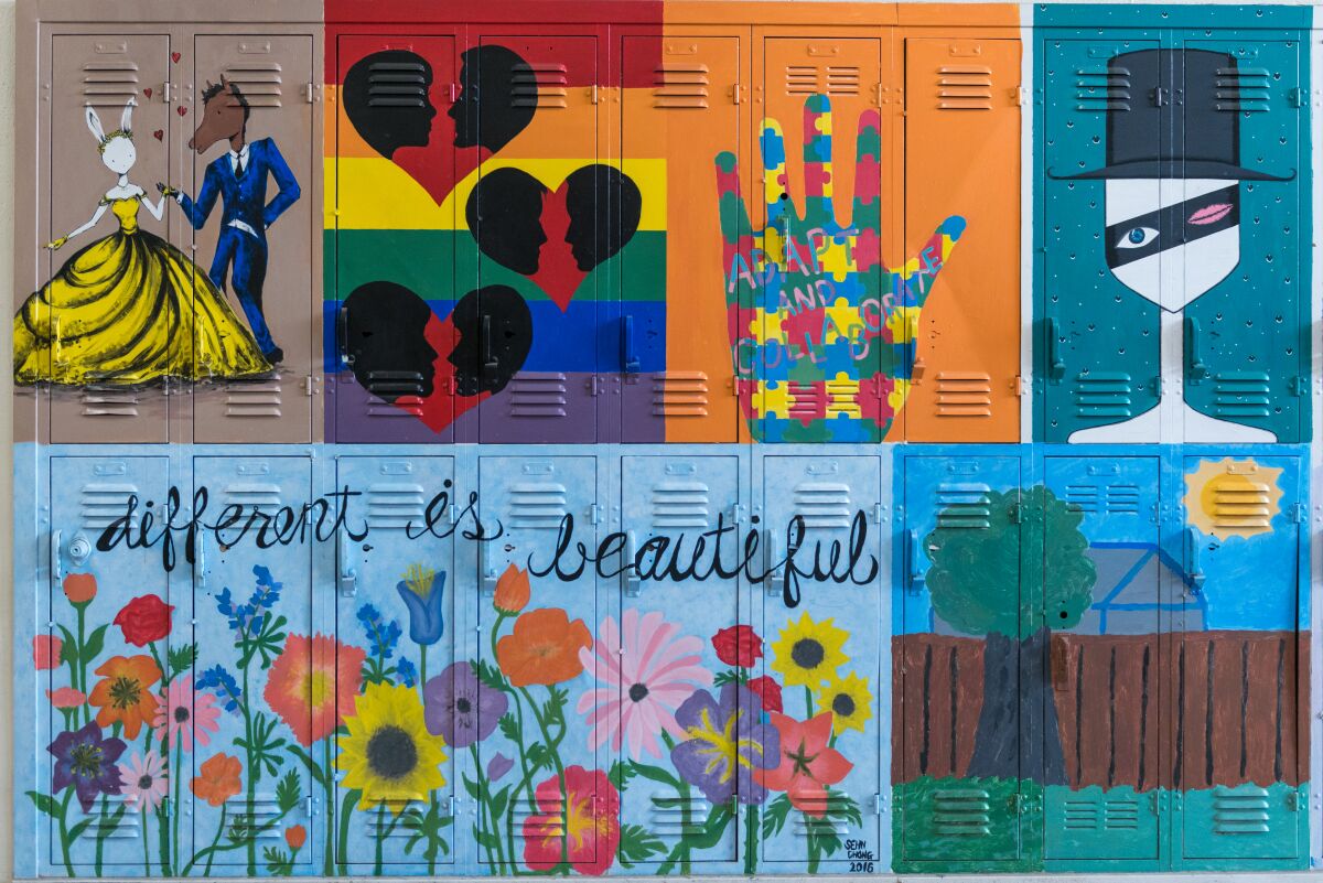Lockers painted in bright colors with flowers, a rainbow and other images 