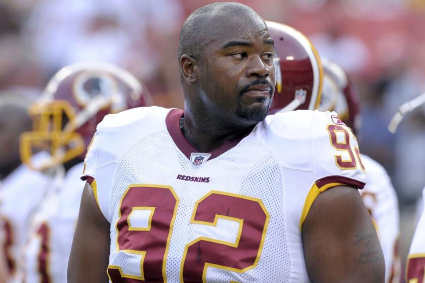 FILE - This Aug. 21, 2010, file photo shows Washington Redskins defensive lineman Albert Haynesworth before an NFL preseason football game against Baltimore Ravens, in Landover, Md. The Haynesworth headache just won't go away, even in December with the Redskins (5-7) essentially out of the picture and morphing into wait'll-next-year mode. He didn't have a good practice Thursday, according to coach Mike Shanahan, then showed up late Friday and was limited because of the unspecified illness. Shanahan thus decided to make Haynesworth inactive for Sunday's game against the New York Giants, but the coach didn't let the decision be known until shortly before kickoff. (AP Photo/Susan Walsh, File) ORG XMIT: NY174