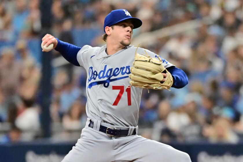 ST PETERSBURG, FLORIDA - MAY 28: Gavin Stone #71 of the Los Angeles Dodgers delivers a pitch to the Tampa Bay Rays.