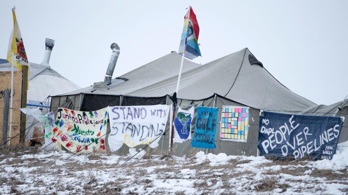 Signs of protest at the Oceti Sakowin Camp last month on the edge of North Dakota's Cannonball River, near the Standing Rock Sioux Reservation.