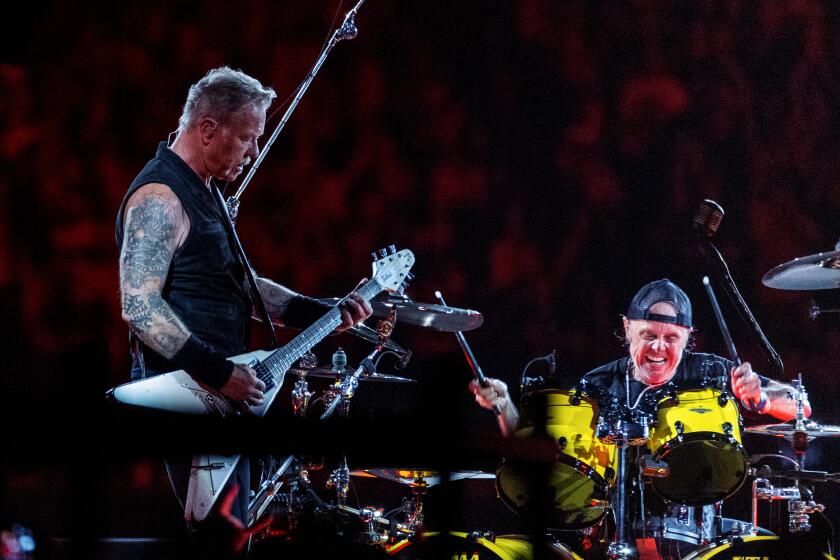 James Hetfield, left, and Lars Ulrich of Metallica perform at the Metallica - M72 World Tour at SoFi Stadium on August 25, 2023 in Inglewood, California. (Photo by Ringo Chiu / For The Times)