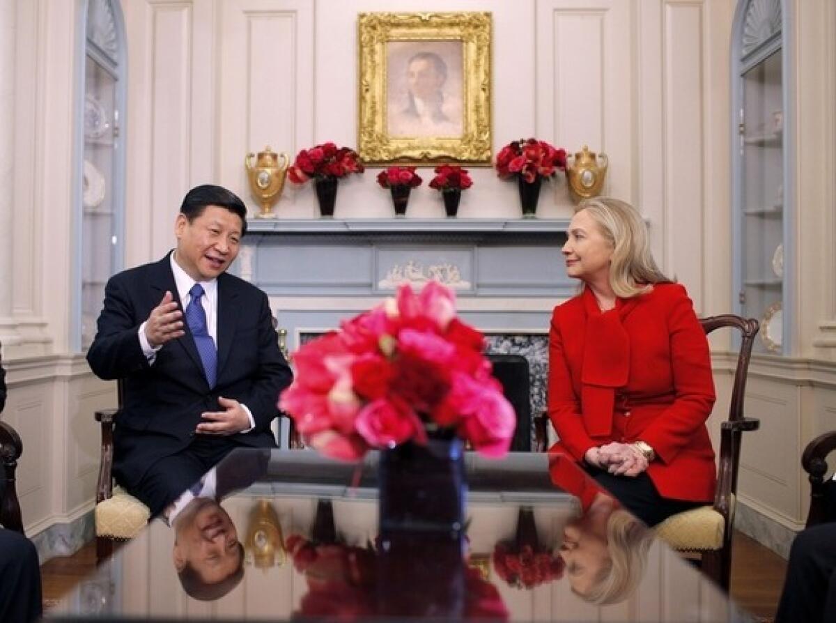 Secretary of State Hillary Rodham Clinton meets with Chinese Vice President Xi Jinping at the State Department in Washington.