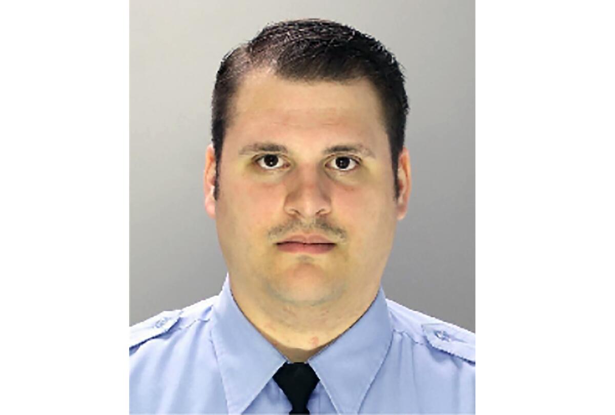 This undated photo provided by Philadelphia Police Department shows former Philadelphia police Officer Eric Ruch Jr., charged with first-degree murder, Oct. 9, 2020 in the 2017 shooting of a Black man after a high-speed car chase. Ruch Jr. became "distraught” when he learned that the Black motorist he fatally shot did not have a gun in his pocket, his lawyer said as the ex-officer’s third-degree murder trial began Tuesday, Sept. 13, 2022. (Philadelphia Police Department via AP)