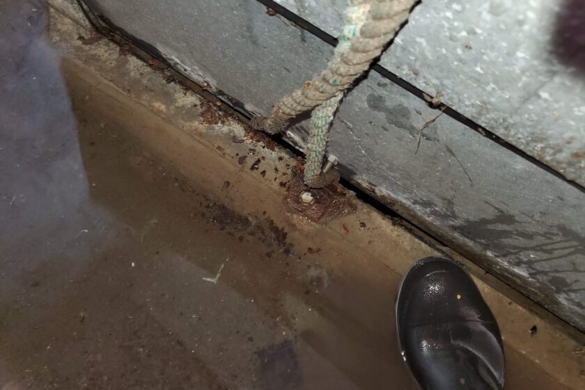 This rope became lodged in swing gate separating a storm water pipe from Poway' clearwell drinking water reservoir in late November. The result was a nearly week-long boil-water advisory for about 50,000 Poway residents.