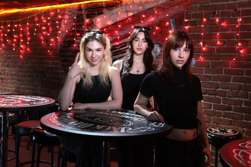 WEST HOLLYWOOD, CALIFORNIA- From left, Sisters Daniela Villarreal, Alejandra and Paulina at the Whiskey A Go Go in West Hollywood. (Wally Skalij/Los Angeles Times)