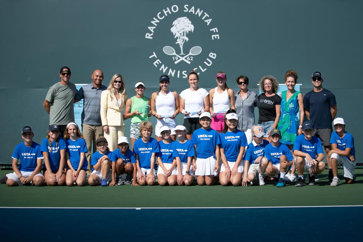 The RSF Open winners, sponsors, RSF Tennis Club staff and young players.