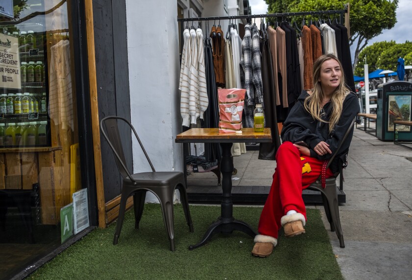 Coronavirus Today: Welcome to a new era - Los Angeles Times 2 Madison Howell enjoys some celery juice outside Kreation Organic Juicery in Larchmont Village.