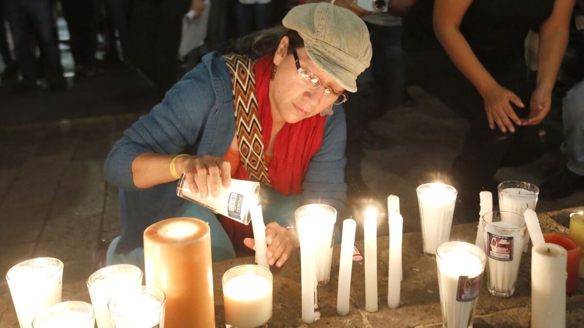 Three Mexican film students who were kidnapped and killed are remembered at a shrine erected outside the Jalisco state governor's residence in Guadalajara.