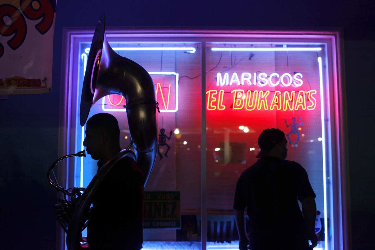 Musicians hang out in front of the El Bukanas restaurant in La Puente, which showcases local bands on weekend nights. Southern California is the tuba capital of the world, according to many. Change came slowly to Mexican tuba playing, but it's now in full force. See full story