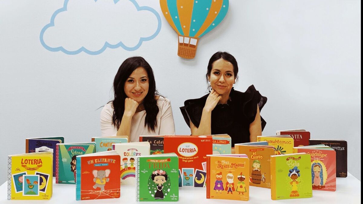 Lil' Libros founders Ariana Stein and Patty Rodriguez with some of their bilingual children's books