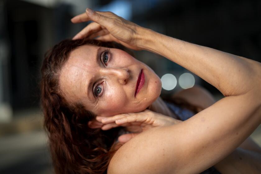 San Diego, CA - August 11: Cecily Holcombe, 51 and a San Diego Dance Theater company member. She will be performing in Trolley Dances in the fall, which begins rehearsals on August 14. Cecily also has choreographed works for Live Arts Fest and danced for a range of projects by artists including, John Malashock, Patricia Rincon Dance Collective, Allyson Greene, Terry Wilson, Monica Bill Barnes, Dorn Dance Company, Anne Gehman, and Lavina Rich. She earned a bachelor of science degree in physics from UCSD and teaching credentials in science and dance from San Francisco State University. (Nelvin C. Cepeda / The San Diego Union-Tribune).