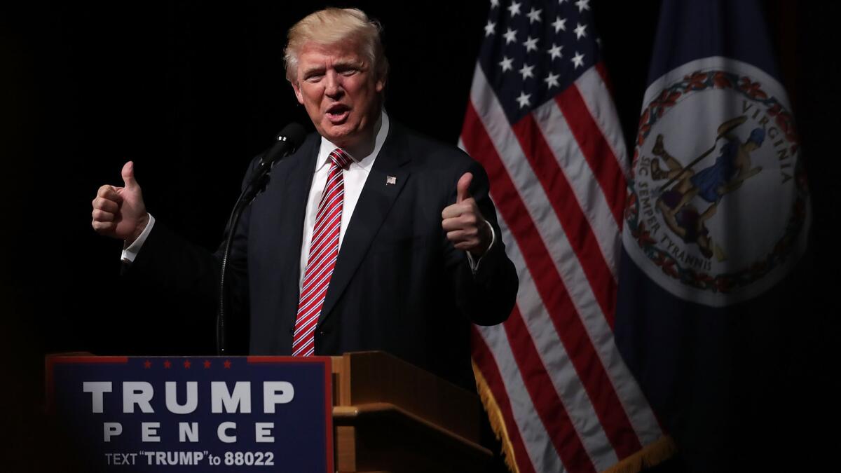 Republican presidential nominee Donald Trump campaigns in Ashburn, Va., on Tuesday.