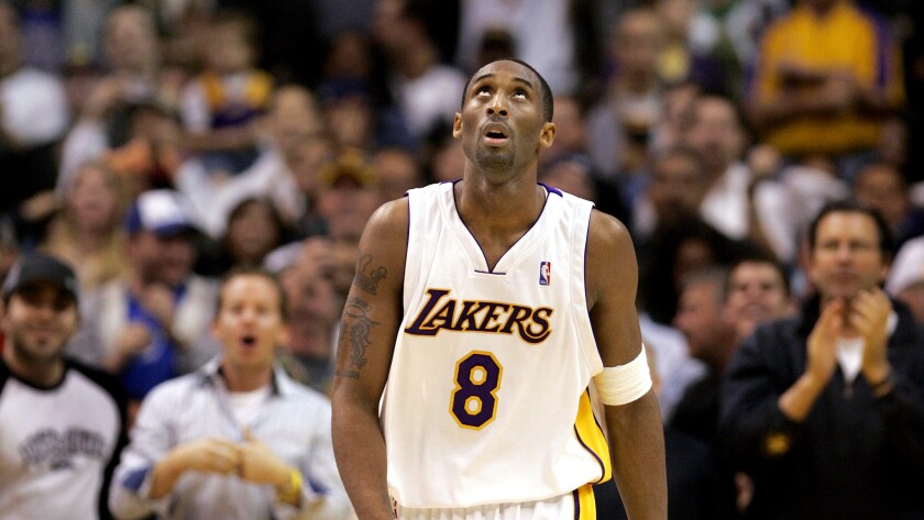 Kobe Bryant looks up at the Staples Center scoreboard and his 81-point total during the final seconds of a 122-104 victory over the Toronto Raptors on Jan. 22, 2006.