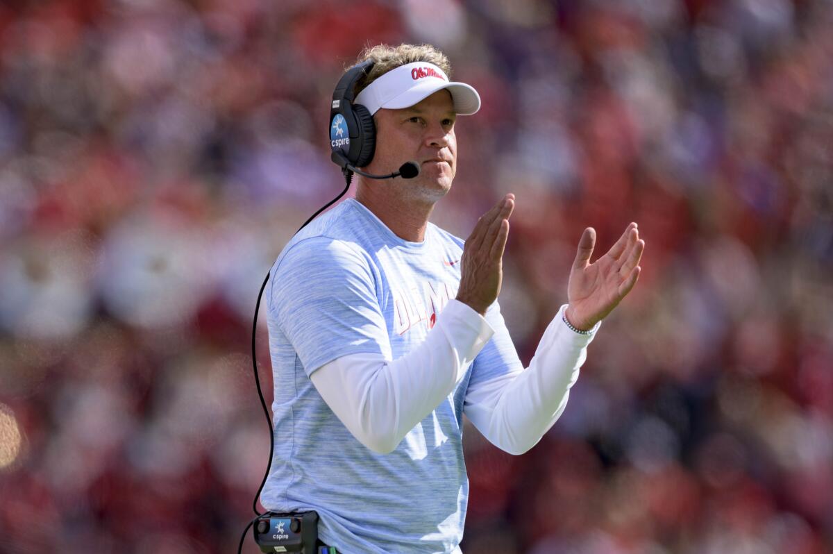 Mississippi coach Lane Kiffin claps during a game against LSU on Oct. 22.