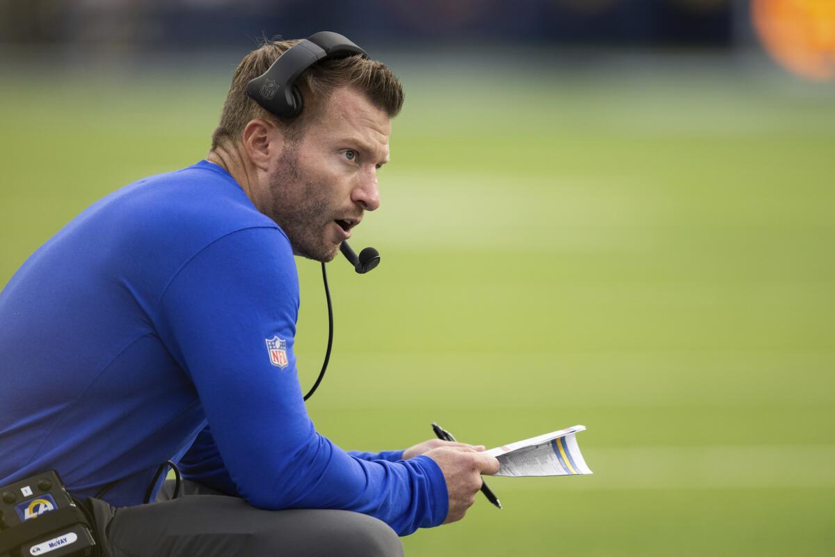 Los Angeles Rams head coach Sean McVay watches his players during an NFL football game.