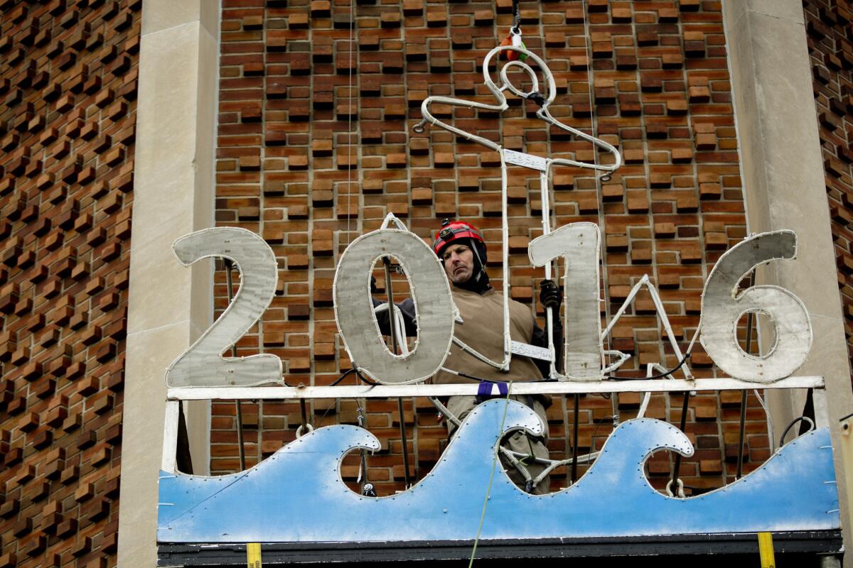 A decoration to celebrate New Year's Day is put into place in Port Huron, Mich.