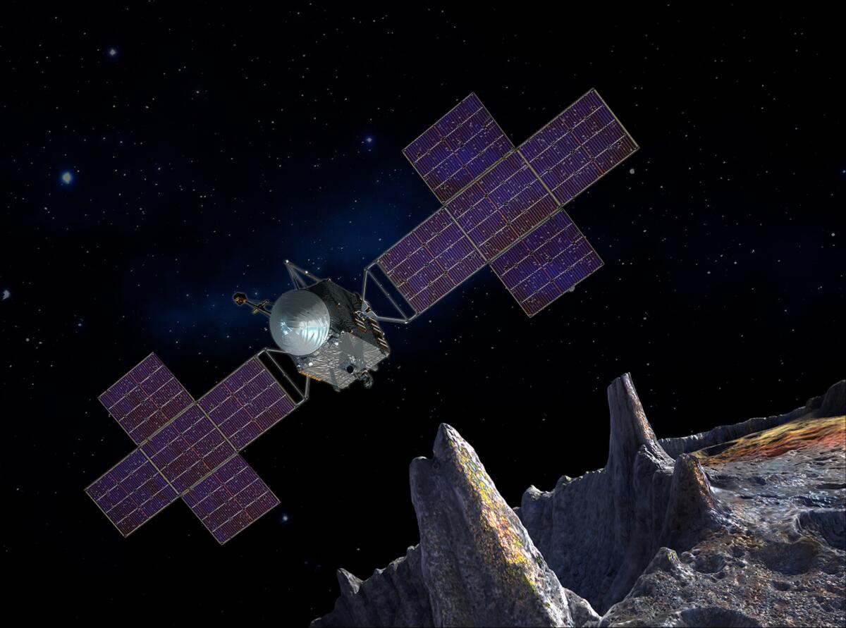 An illustration of NASA's Psyche spacecraft near the surface of a metal-rich asteroid.