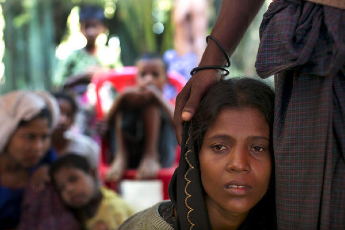 Rohingya patients wait for medical care at a government-run medical clinic on the outskirts of Sittwe, Myanmar.