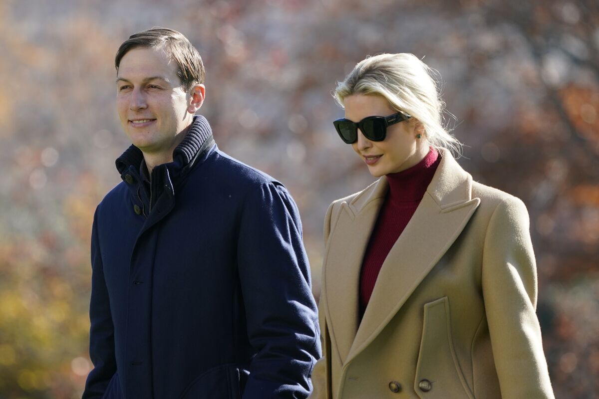 President Donald Trump's White House Senior Adviser Jared Kushner and Ivanka Trump, the daughter of President Trump, walk on the South Lawn of the White House in Washington, Sunday, Nov. 29, 2020, after stepping off Marine One upon returning from Camp David. (AP Photo/Patrick Semansky)