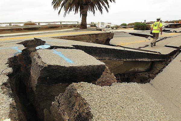 A coastal bluff on Paseo del Mar in San Pedro is slowly buckling and sliding toward the ocean on Monday, November 14, 2011.