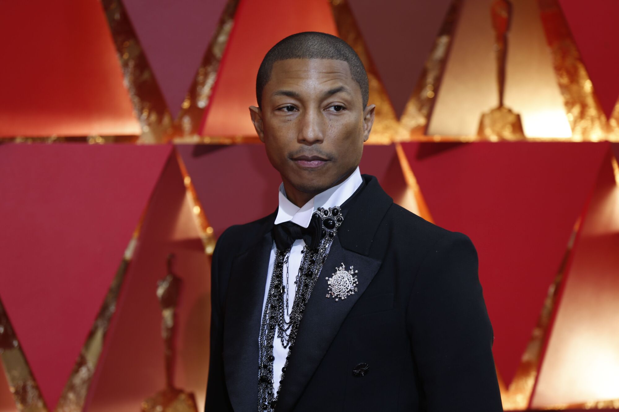 Pharrell Williams arrives at the Oscars in 2017. 