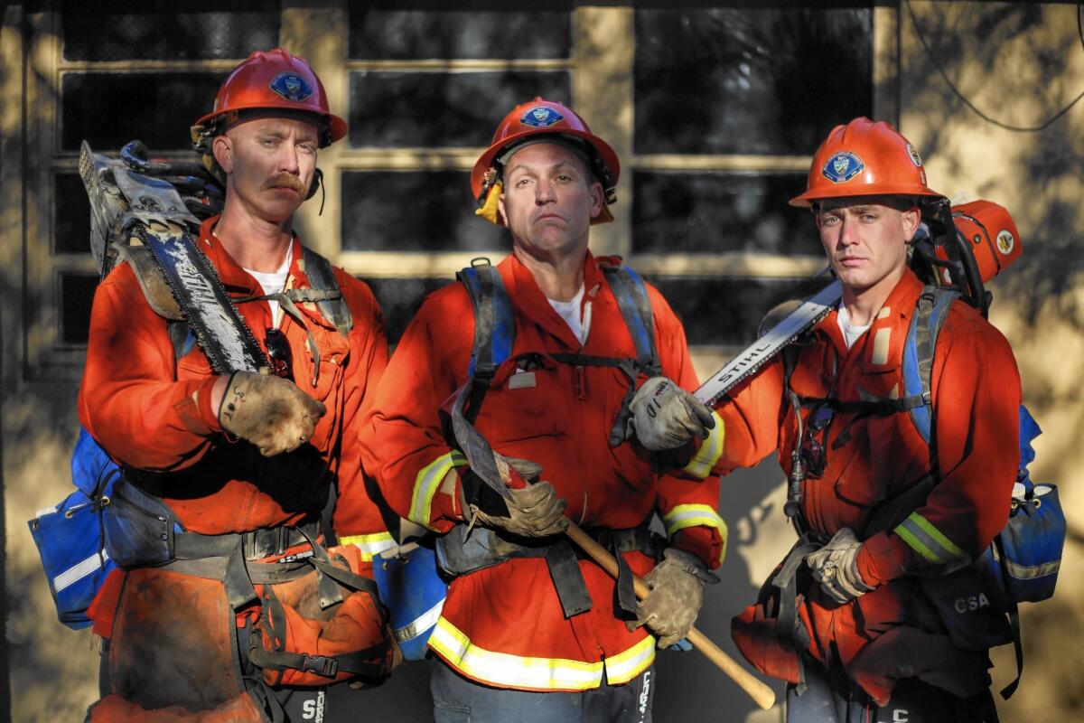 William Winegardner, 34, left, of Hesperia, Tim Johnson, 49, of San Bernardino and James Jones, 26, of Barstow, served on a San Bernardino County inmate fire crew.