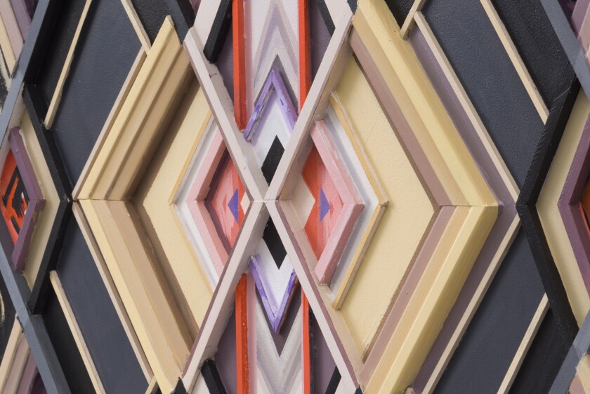 Three-dimensional shapes in pale yellow and dark blue