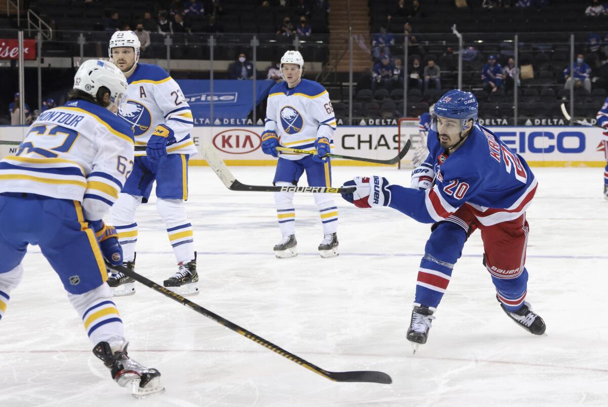 New York Rangers' Chris Kreider (20) scores a second-period goal against the Buffalo Sabres during an NHL hockey game Tuesday, March 2, 2021, in New York. (Bruce Bennett/Pool Photo via AP)