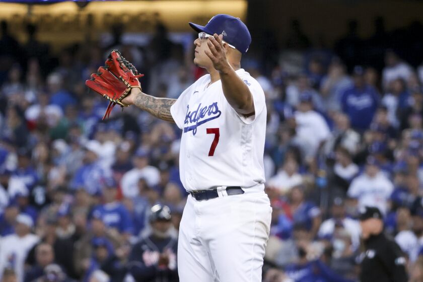 Los Angeles, CA - October 20: Los Angeles Dodgers starting pitcher Julio Urias reacts after an RBI single.