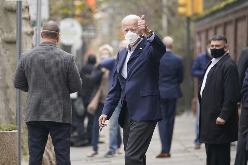President-elect Joe Biden leaves a doctor's appointment at Pennsylvania Hospital in Philadelphia, Saturday, Dec. 12, 2020. Biden was in for a routine two-week post-injury follow up on his fractured foot. (AP Photo/Susan Walsh)