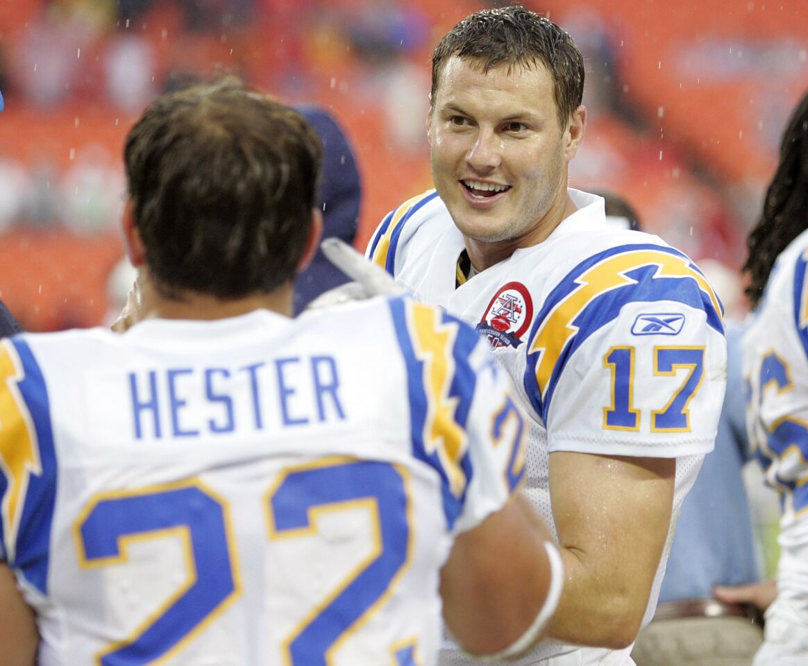 Chargers Philip Rivers talks with Jacob Hester after his punt block for a touchdown in the 4th quarter against the Chiefs at Arrowhead Stadium on Oct. 25, 2009.