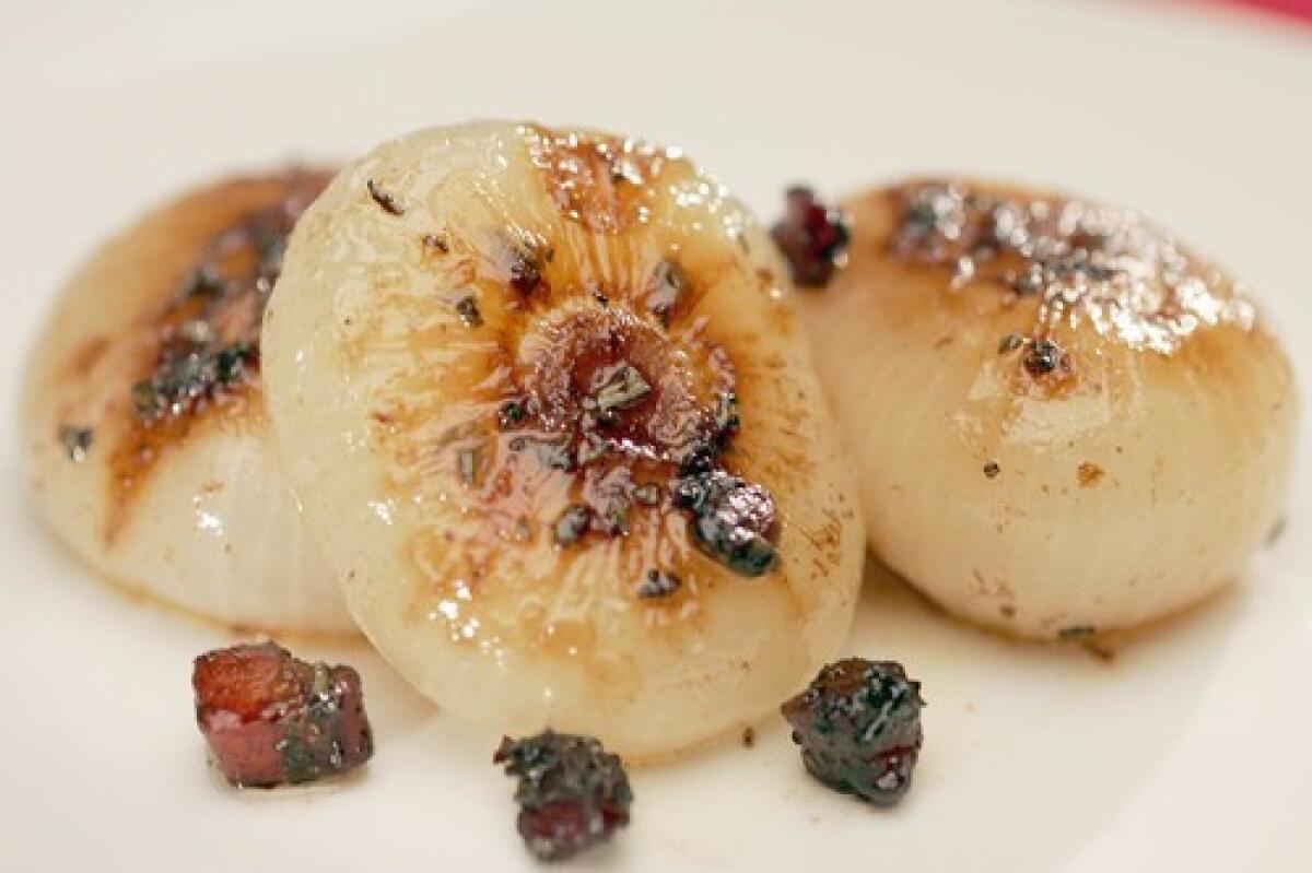 ON THE SIDE: Glazed cipollini onions with pancetta, balsamic and rosemary.
