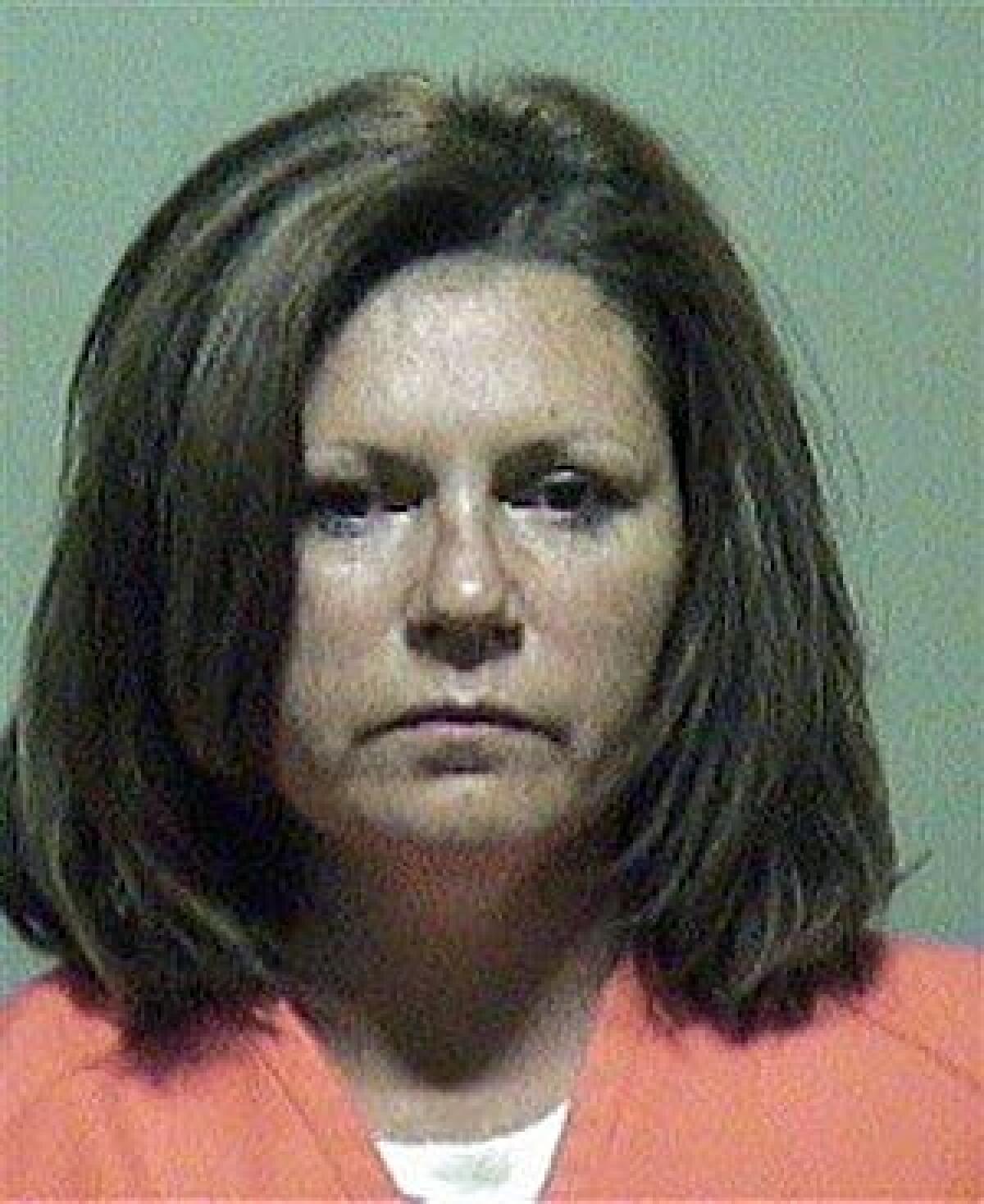 Debbie R. Miller, in this undated photo provided by the Outagamie County Jail, claimed to find the rat in her lunch April 17 as she ate at the upscale Seasons Restaurant in Grand Chute, according to the criminal complaint.