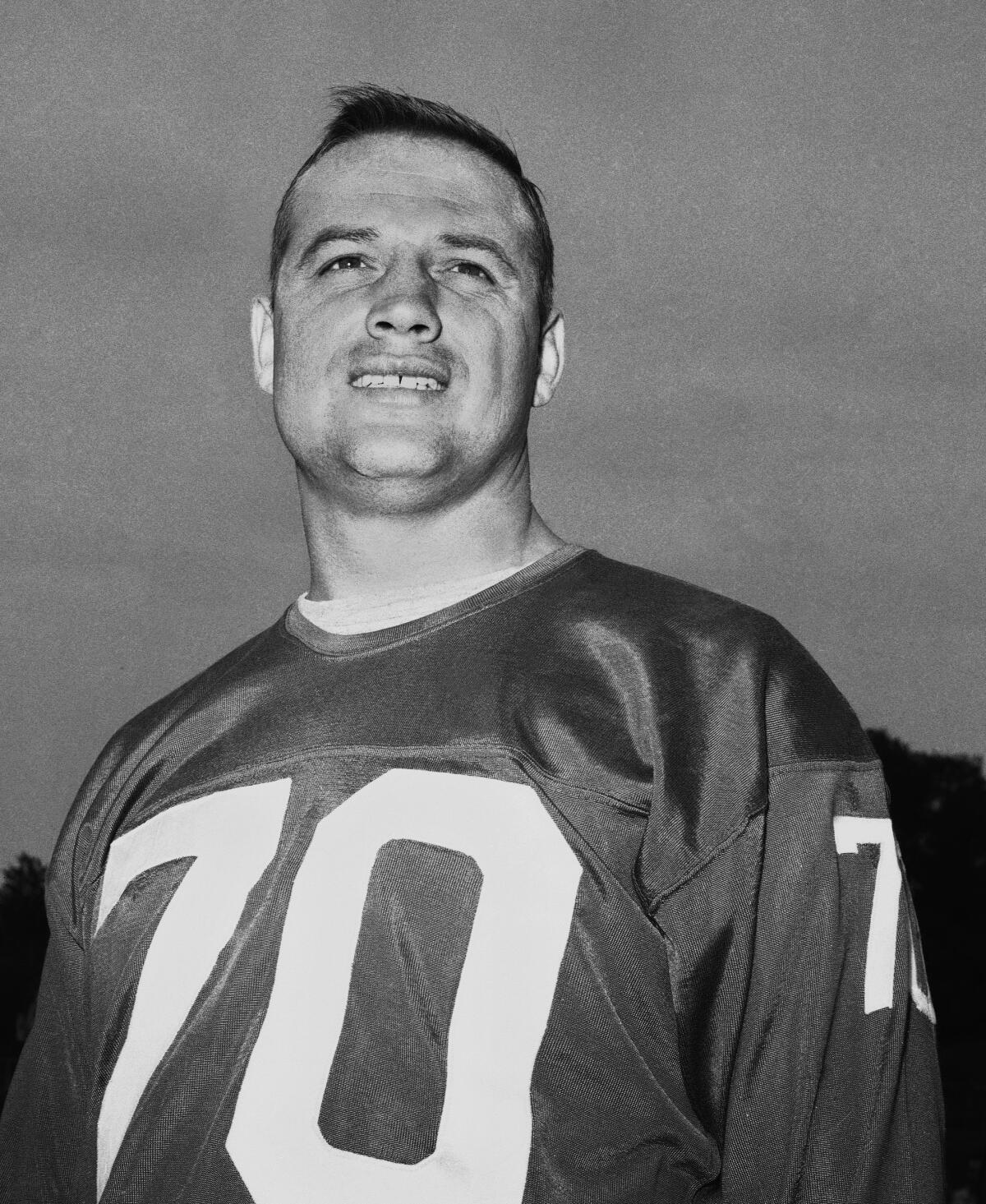 New York Giants linebacker Sam Huff poses for a photo at training camp in Fairfield, Conn., in 1963. 