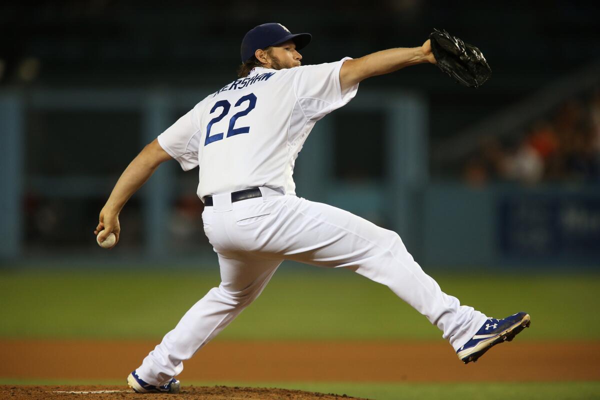 Dodgers starting pitcher Clayton Kershaw throws against the Giants at Dodger Stadium on Sept. 2.