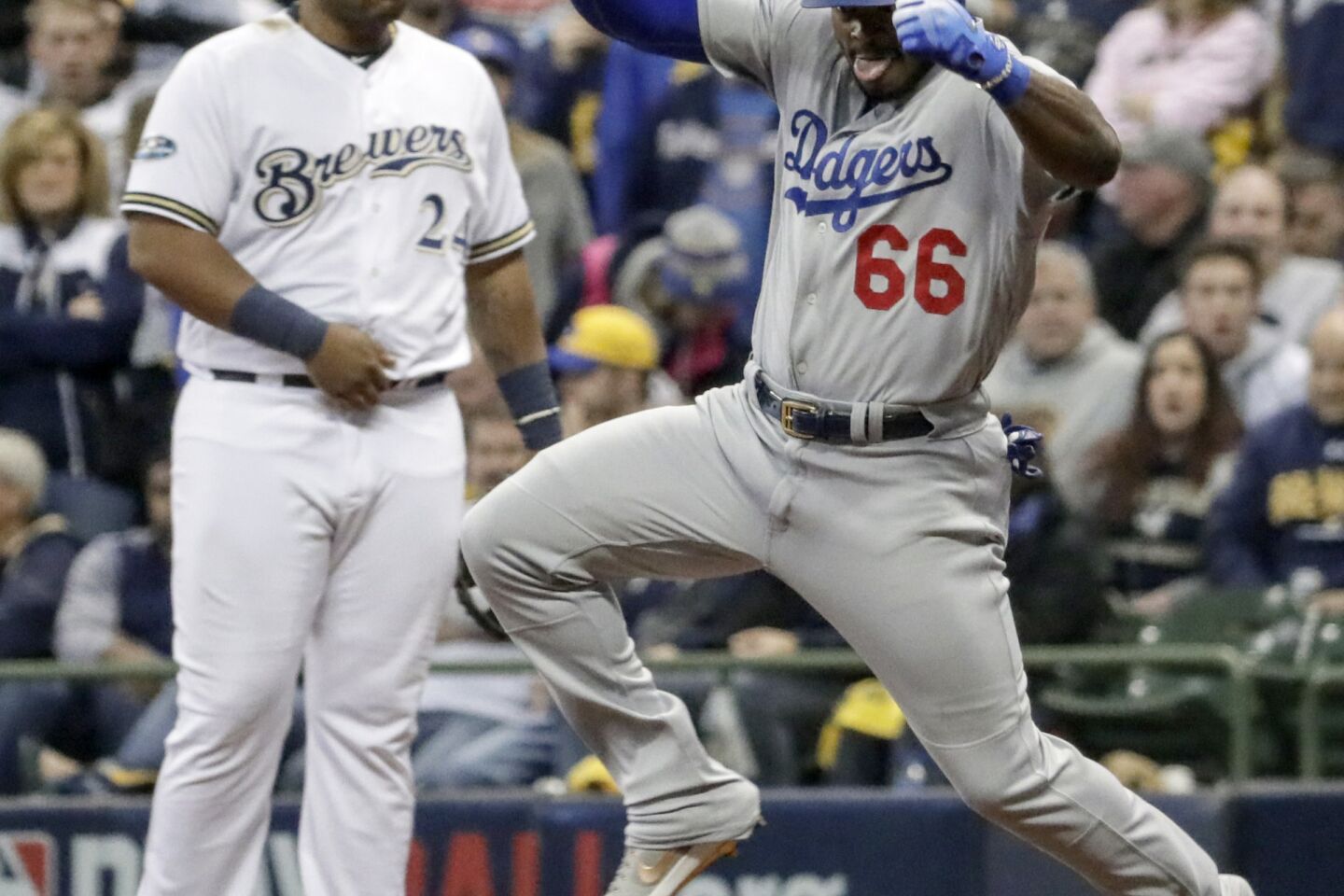Yasiel Puig is pumped after hitting a three run homer in the sixth inning
