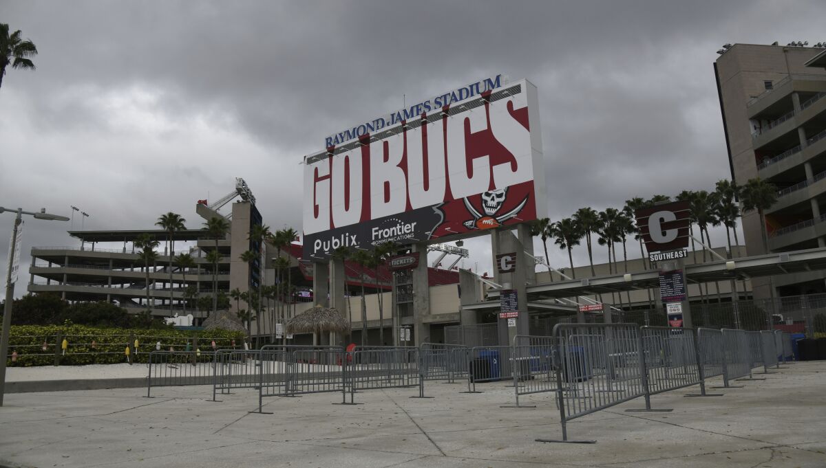Empty ticket lines are shown outside Raymond James Stadium