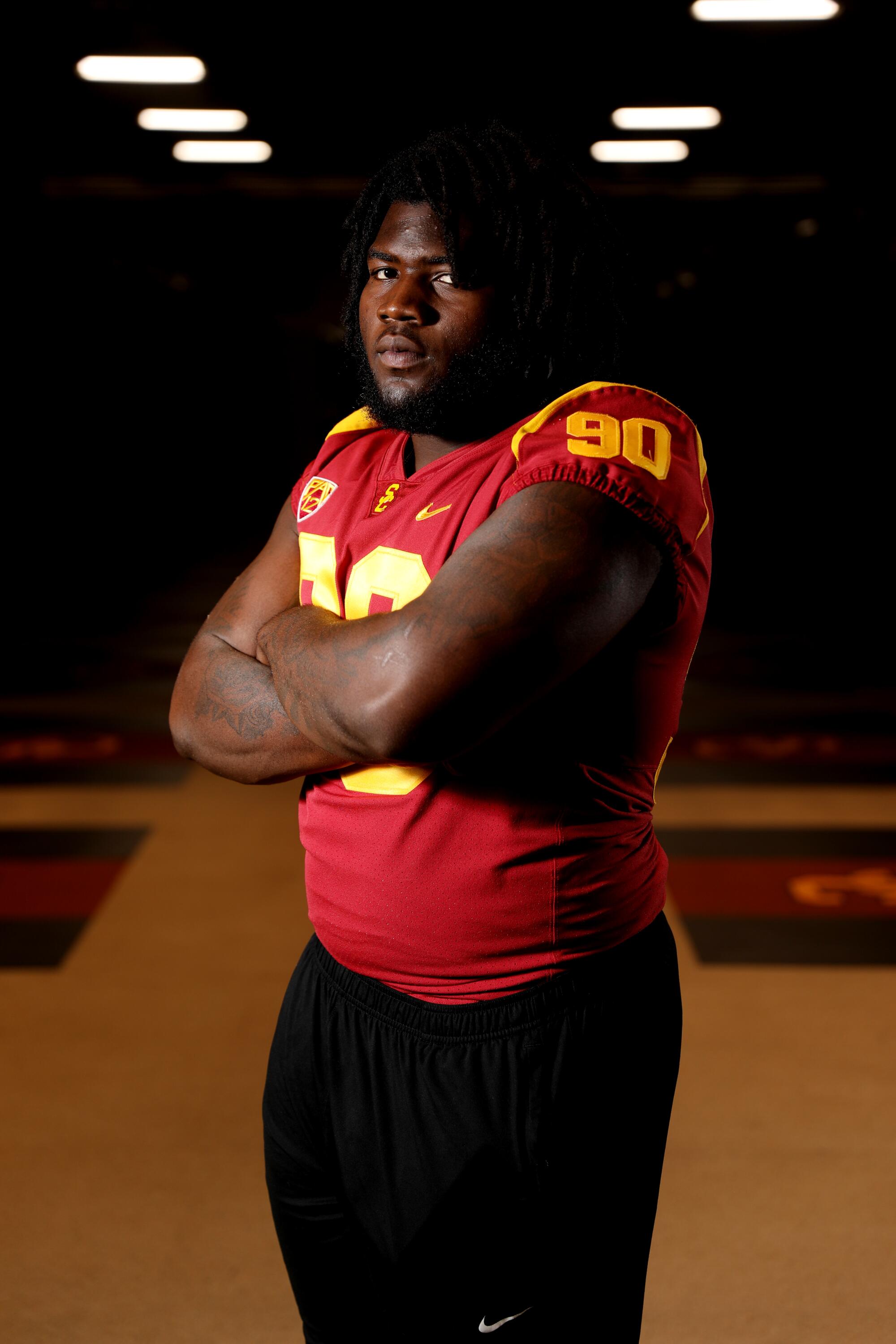 USC defensive lineman Bear Alexander poses for a portrait during football media day 