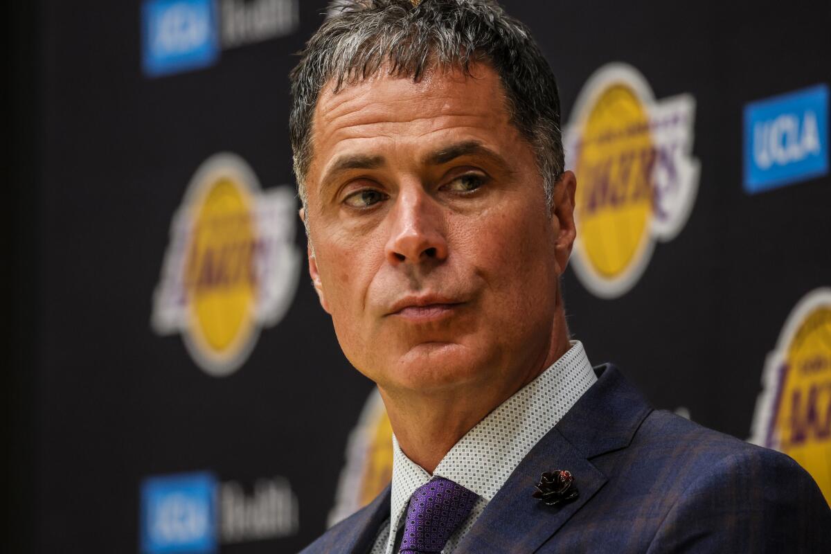 Rob Pelinka at a news conference.