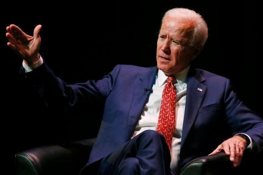 Former Vice President Joe Biden speaks at the University of Utah Thursday Dec. 13, 2018, in Salt Lake City. Biden says he initially refused to run with then-presidential candidate Barack Obama a decade ago, but his family ultimately convinced him he had to support an African-American candidate with a real chance of winning. Biden was greeted with a standing ovation when he spoke amid speculation about whether he'll launch his own campaign for president. He did not directly address the possibility of another run in the speech that marks his final public event for 2018. (AP Photo/Rick Bowmer)