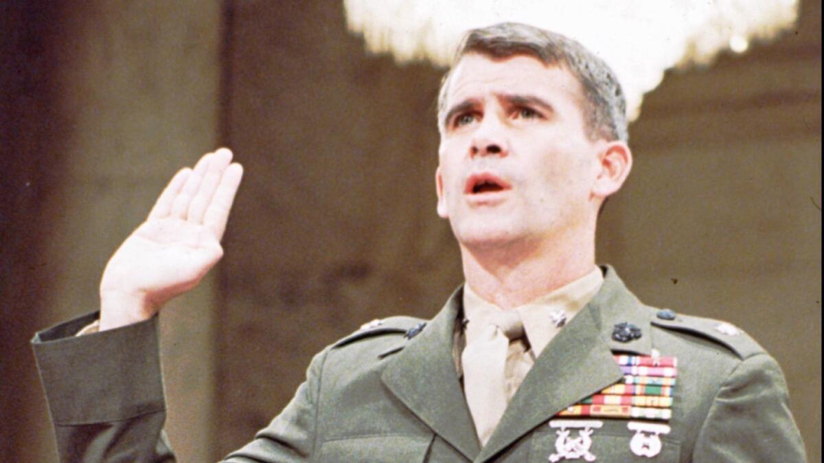 Lt. Col. Oliver North is sworn in for Iran-Contra hearings in July 1987.