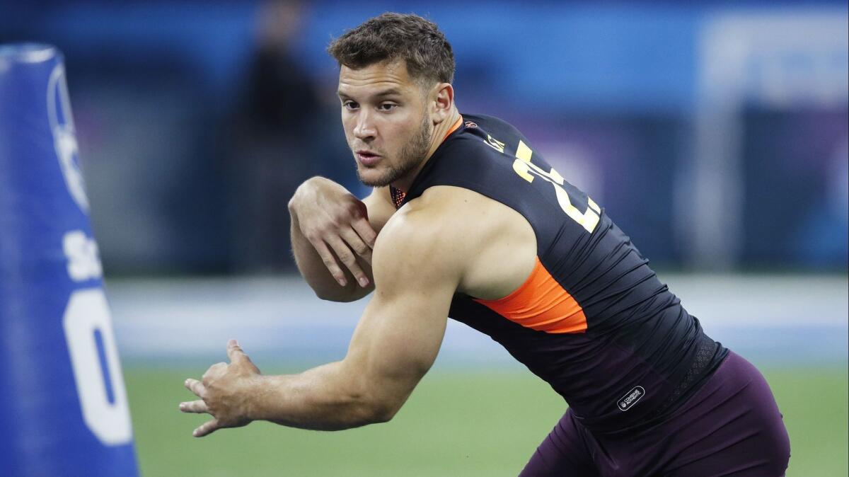 Ohio State's Nick Bosa runs a drill at the NFL scouting combine in March