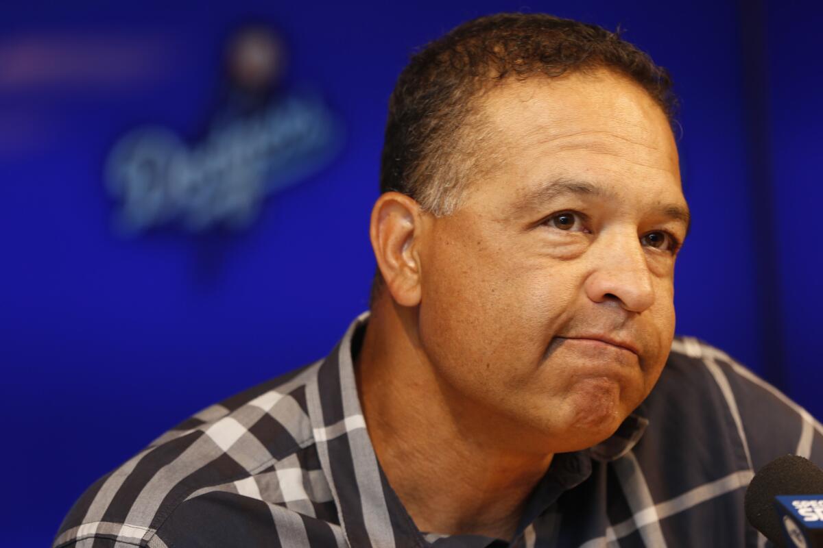 Dodgers Manager Dave Roberts discusses the team's injury-plagued season that finished short of the World Series during a news conference at Dodger Stadium on Oct. 24.