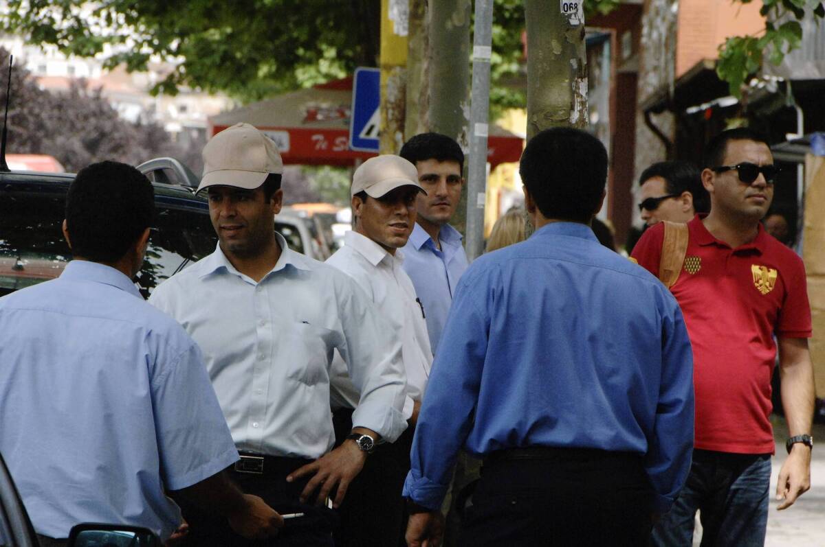 Members of the Iranian opposition group Mujahedin Khalq in a street in Tirana, Albania. The exiles have been moved to Albania from a camp in Iraq as part of a relocation process.