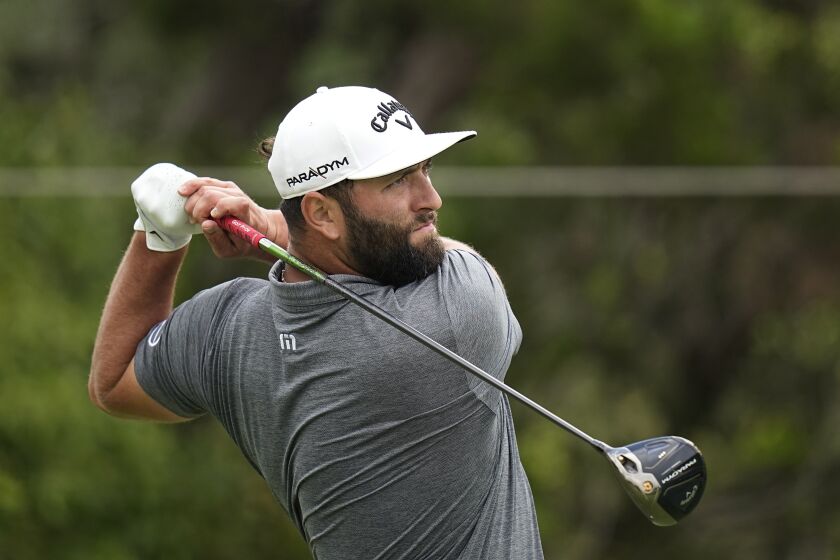 FILE - Jon Rahm, of Spain, plays his shot from the second tee during the second round of the Dell Technologies Match Play Championship golf tournament in Austin, Texas, Thursday, March 23, 2023. (AP Photo/Eric Gay, File)